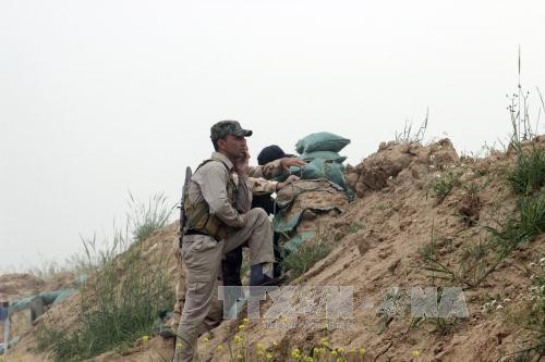 Các lực lượng Iraq tham gia chiến dịch giải phóng Bashir, Kirkuk ngày 10/4. Ảnh: THX/TTXVN