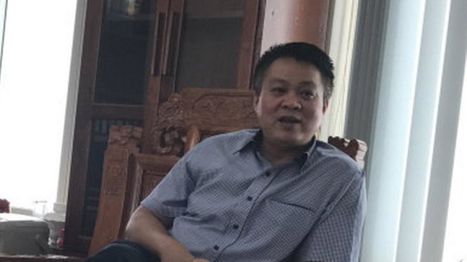 Ông Phạm Sỹ Quý, giám đốc Sở Tài nguyên và môi trường tỉnh Yên Bái, trả lời báo chí ngày 29-6 - Ảnh: Thân Hoàng