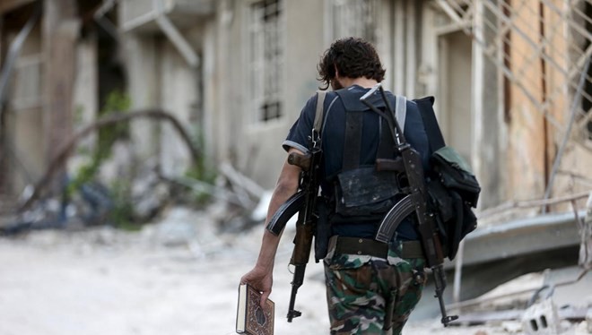 Một chiến binh thuộc thành phần chống chính phủ tại Syria (Nguồn: AFP)