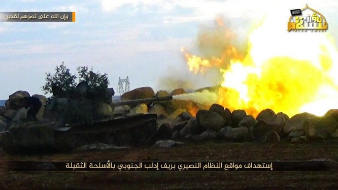 Pháo binh quân đội Syria tấn công phiến quân trên chiến trường Latakia - ảnh minh họa Masdar News