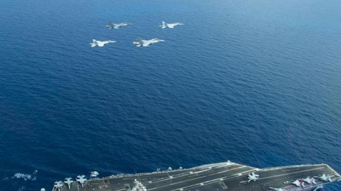 Cụm tấn công tàu sân bay USS Carl Vinson trên Biển Đông. Ảnh: AFP/News.com.au