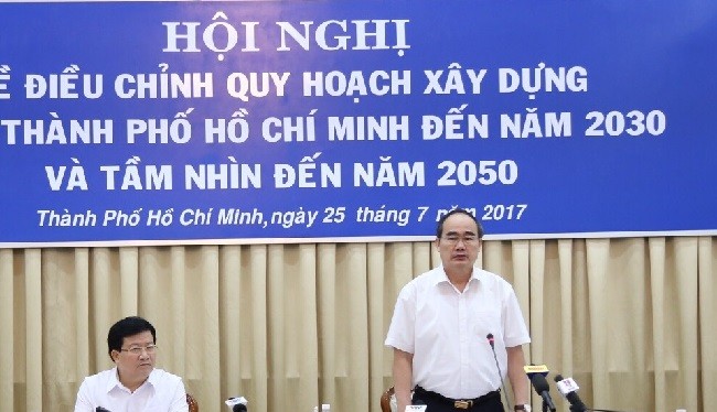 Phó Thủ tướng Trịnh Đình Dũng cùng Bí thư Thành ủy TPHCM Nguyễn Thiện Nhân