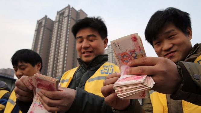 Tiền mặt ngày càng vắng bóng trong các hoạt động thương mại tại Trung Quốc (ảnh: Getty Images)