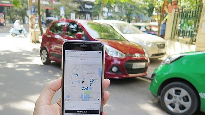 Các hãng taxi truyền thống cho rằng Grab và các hãng taxi công nghệ khác đang cạnh tranh thiếu lành mạnh, phá giá thị trường. Ảnh: Bộ Công thương