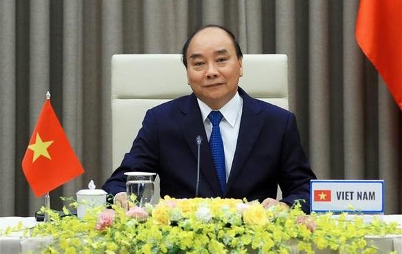 Thủ tướng Nguyễn Xuân Phúc phát biểu tại một cuộc họp trực tuyến quốc tế.