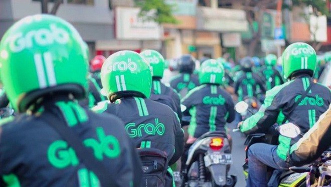 Grab vừa nhận thêm 1 tỷ USD từ các nhà đầu tư, chỉ hơn một tháng sau khi hãng nhận được 1 tỷ USD từ Toyota Motor Corp. (Ảnh: Bloomberg)