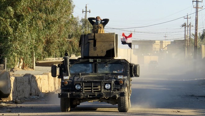 Binh sỹ chống khủng bố Iraq làm nhiệm vụ tại khu vực ngoại ô Ramada ngày 13/1. (Nguồn: AFP/TTXVN)