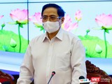 Thủ tưởng Phạm Minh Chính tại cuộc họp với TP.HCM sáng 13/5 -Ảnh Huyền Mai