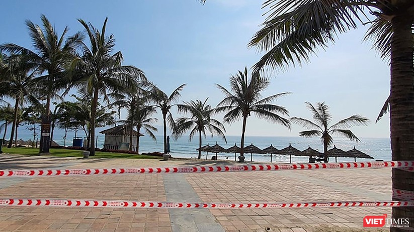 Ảnh: Biển Đà Nẵng vắng bóng người sau khi phát hiện ca mắc COVID-19 mới trong cộng đồng ảnh 7