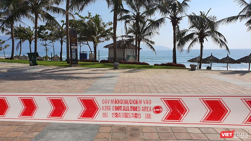 Ảnh: Biển Đà Nẵng vắng bóng người sau khi phát hiện ca mắc COVID-19 mới trong cộng đồng ảnh 3
