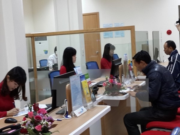 Khuyến khích nhà đầu tư nước ngoài mua lại, sáp nhập ngân hàng yếu kém ảnh 1