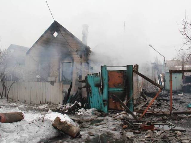 “Chảo lửa” Debaltsevo tan hoang sau trận huyết chiến khốc liệt ảnh 16