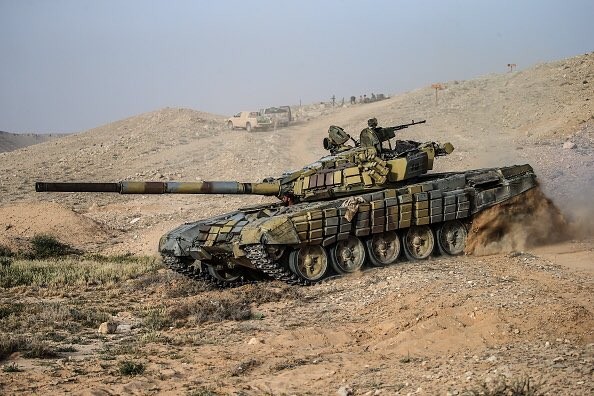 Video + Ảnh: Ác liệt trận chiến giành thành phố cổ Palmyra ảnh 27