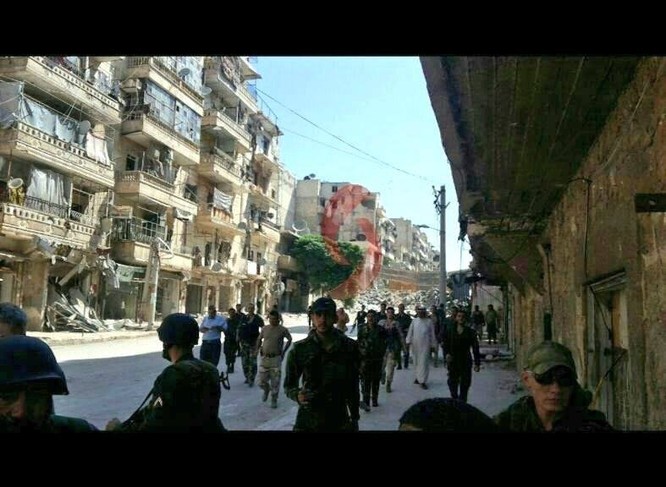 75 gia đình ở khu vực vây hãm đã ra được vùng giải phóng ở Aleppo ảnh 6