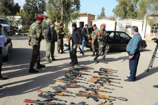 Chiến sự Syria: 700 tay súng thánh chiến nộp vũ khí đầu hàng ảnh 3