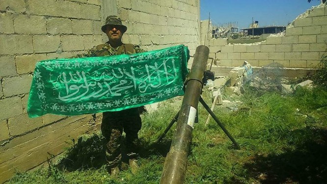 Quân đội Syria hủy diệt hàng chục xe phiến quân, hơn 50 tay súng thánh chiến chết trận (video) ảnh 9