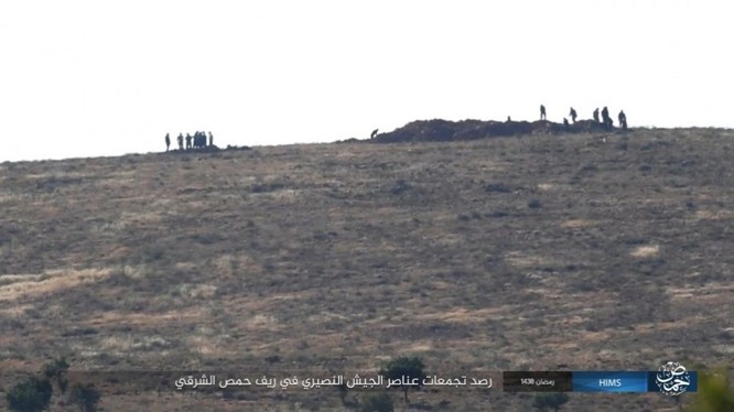 Chiến sự Syria: Quân Assad ồ ạt tiến đánh cứ địa IS và sân bay Homs ảnh 1