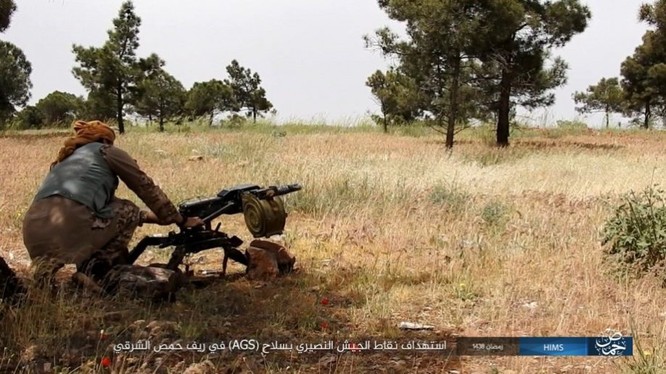 Chiến sự Syria: Quân Assad ồ ạt tiến đánh cứ địa IS và sân bay Homs ảnh 6