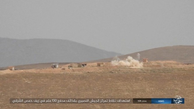 Chiến sự Syria: Quân Assad ồ ạt tiến đánh cứ địa IS và sân bay Homs ảnh 12