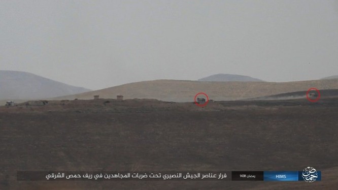 Chiến sự Syria: Quân Assad ồ ạt tiến đánh cứ địa IS và sân bay Homs ảnh 13
