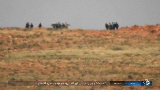 Chiến sự Syria: Quân Assad ồ ạt tiến đánh cứ địa IS và sân bay Homs ảnh 14