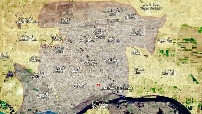 Chiến sự Syria: Người Kurd bao vây "thủ đô" của IS ảnh 1