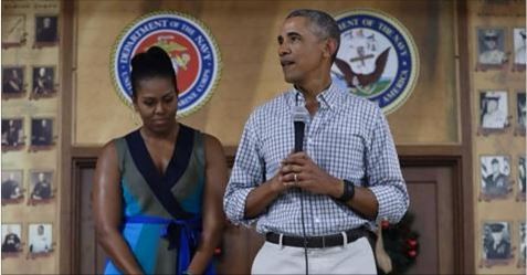 Ông Obama và vợ.