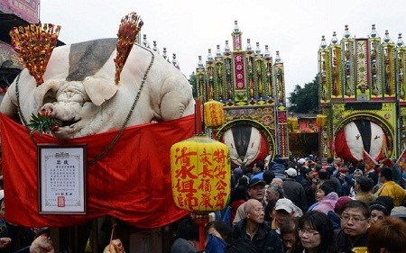Báo quốc tế viết về lễ hội chém lợn của Việt Nam ảnh 8