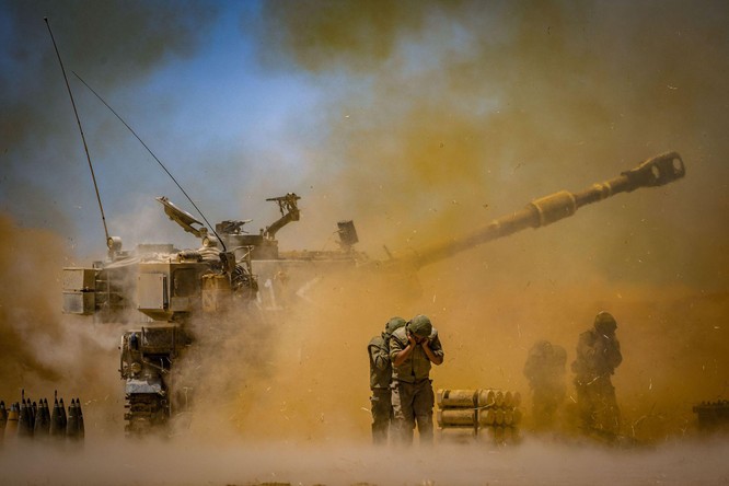 Xung đột Palestine – Israel: Hamas đổi chiến thuật phóng tên lửa; quân đội Israel tấn công mặt đất ảnh 6