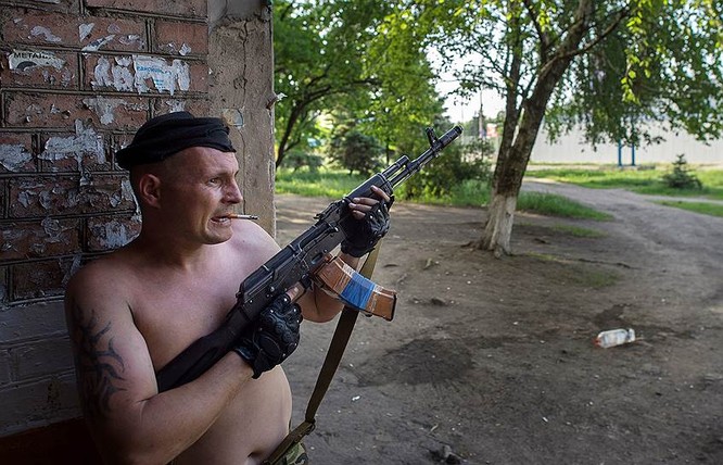 Cận cảnh xung đột Ukraine: một năm thảm họa ảnh 24