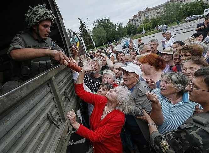 Cận cảnh xung đột Ukraine: một năm thảm họa ảnh 35