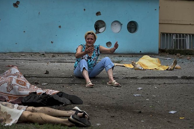 Cận cảnh xung đột Ukraine: một năm thảm họa ảnh 39