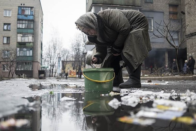 Cận cảnh xung đột Ukraine: một năm thảm họa ảnh 75