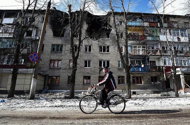 Cận cảnh xung đột Ukraine: một năm thảm họa ảnh 87