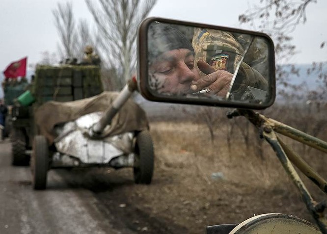 Cận cảnh xung đột Ukraine: một năm thảm họa ảnh 91