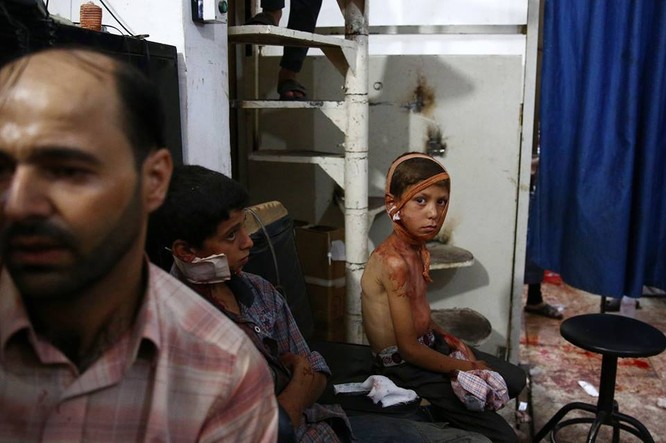 Chùm ảnh thảm họa nhân đạo trẻ em ở địa ngục Syria ảnh 20