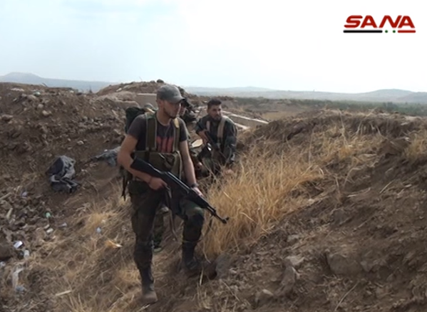 Chiến trận giằng co ác liệt giữa quân đội Syria và chiến binh IS, en - Nursa ảnh 31
