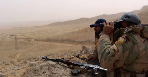 Video + Ảnh: Ác liệt trận chiến giành thành phố cổ Palmyra ảnh 6