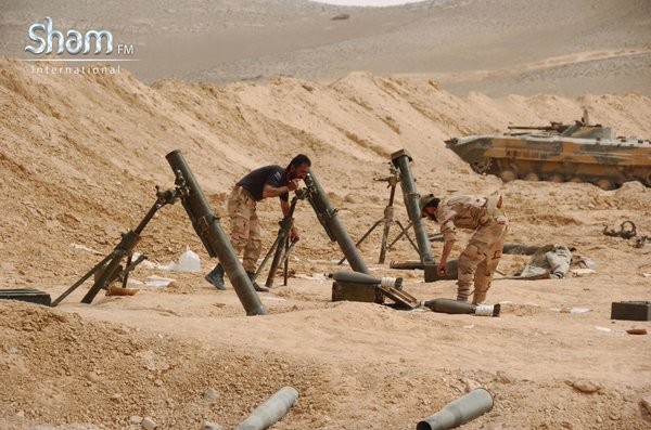 Video + Ảnh: Ác liệt trận chiến giành thành phố cổ Palmyra ảnh 18