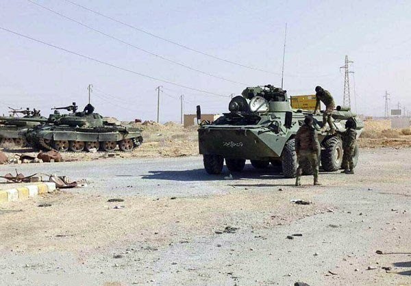 Chiến sự Palmyra: Cận cảnh quân đội Syria phản công IS, tái chiếm thành cổ ảnh 1