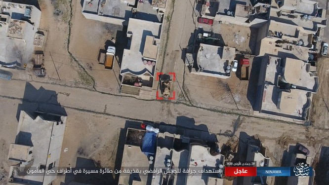 IS không kích bằng UAV, phá hủy xe thiết giáp Iraq ảnh 2