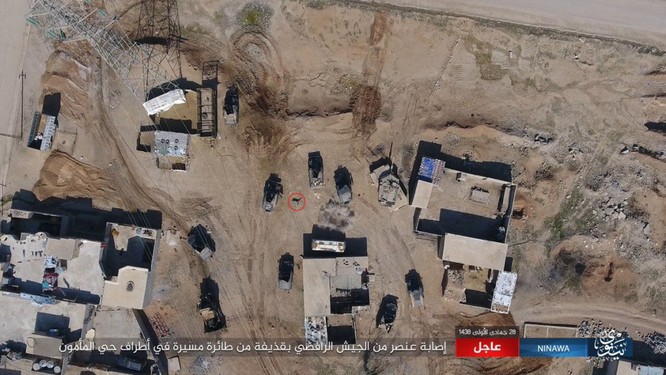 IS không kích bằng UAV, phá hủy xe thiết giáp Iraq ảnh 3