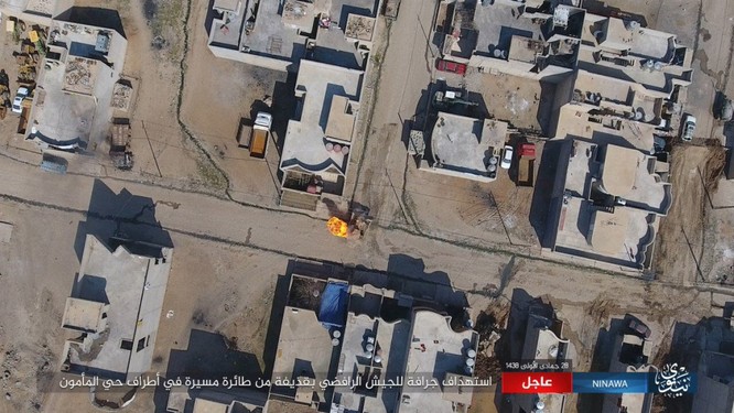 IS không kích bằng UAV, phá hủy xe thiết giáp Iraq ảnh 4