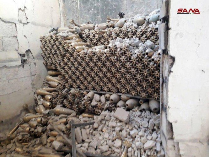 Quân đội Syria phát hiện kho đạn cối khổng lồ của phe thánh chiến tại tử địa Đông Ghouta ảnh 5