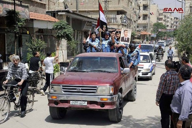 Quân đội Syria thượng cờ trong 3 quận ven Damascus sạch bóng thánh chiến ảnh 5