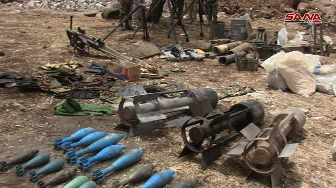Quân đội Syria chiếm giữ lượng vũ khí khổng lồ của phe thánh chiến ở Homs ảnh 5