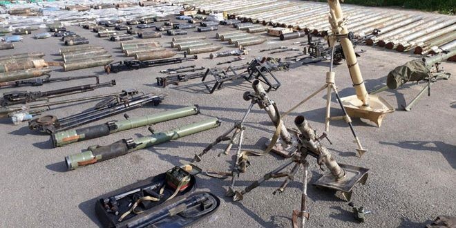Quân đội Syria thu hoạch vũ khí của “quân thánh chiến” tại ngoại ô Damascus ảnh 4