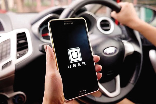 “Đại chiến” taxi: Grab, Uber chiếm lĩnh thị trường ra sao sau 2 năm thí điểm? ảnh 2