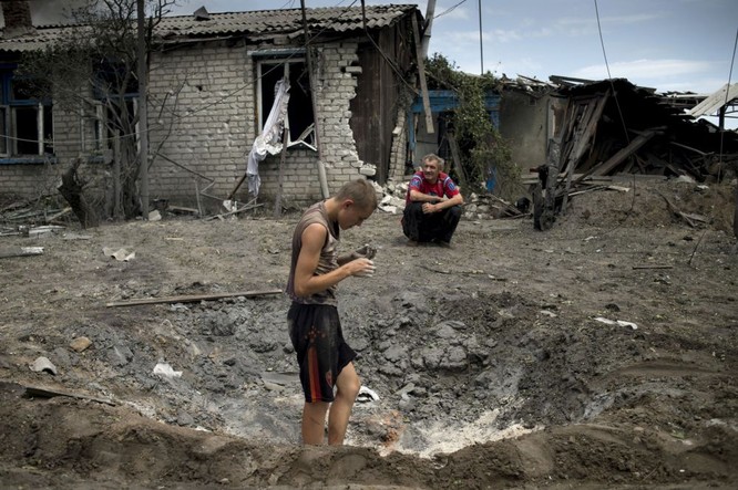 Xung đột Ukraine: Những hình ảnh 'hơn vạn lời nói' ảnh 12