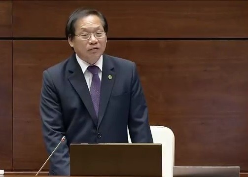 Bộ trưởng Thông tin và Truyền thông Trương Minh Tuấn trong phiên trả lời chất vấn chiều nay. Ảnh: AL